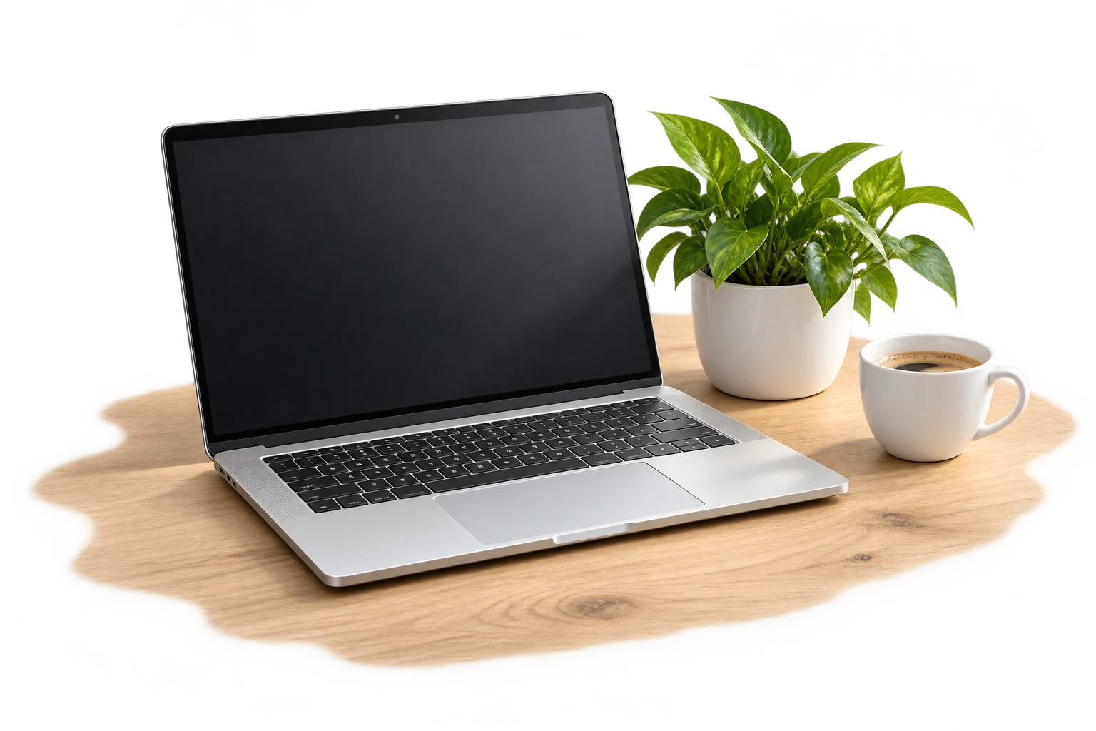 Laptop, plantă și ceașcă într-un spațiu de telemuncă